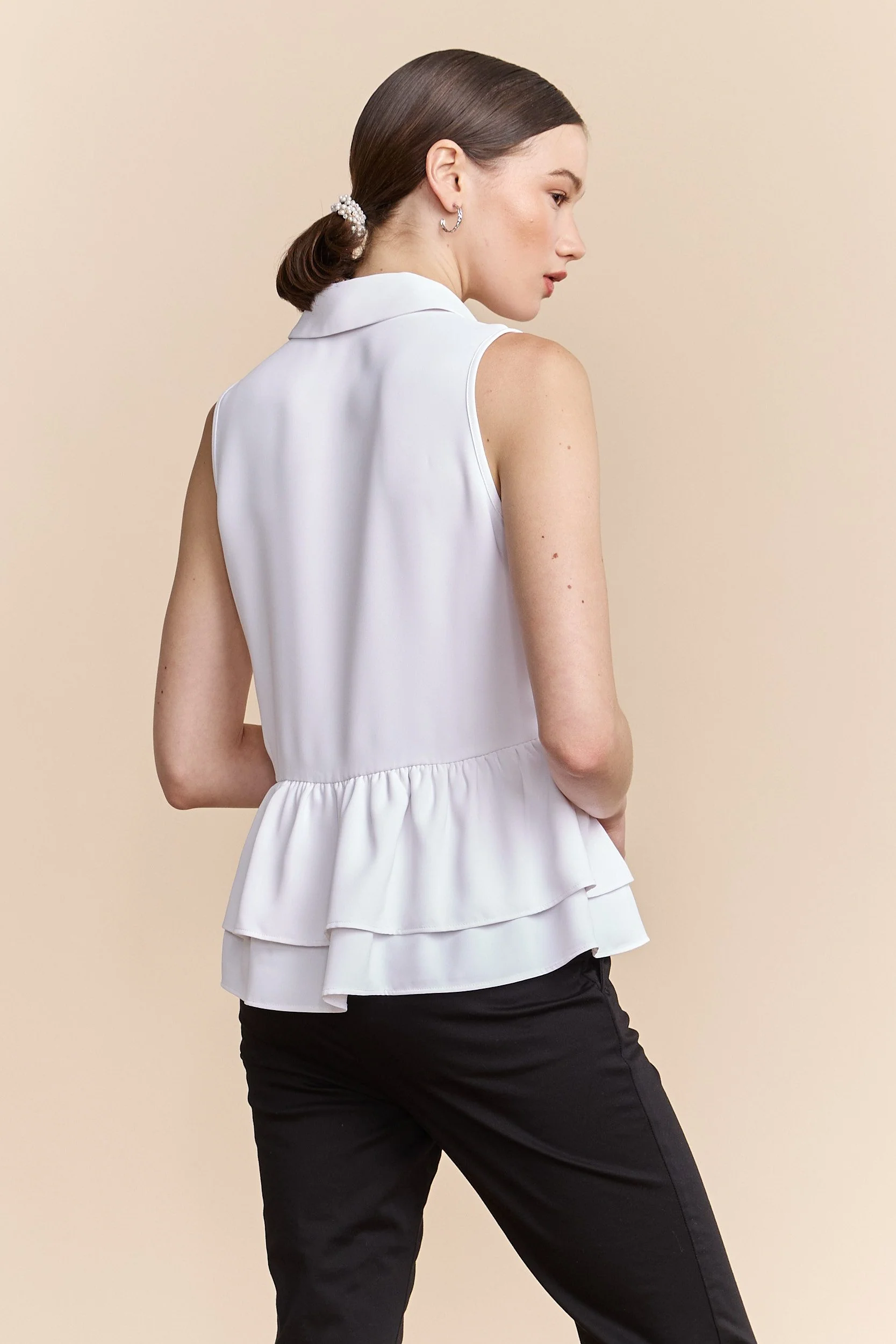 Sleeveless blouse with ruffles at bottom - Image 2