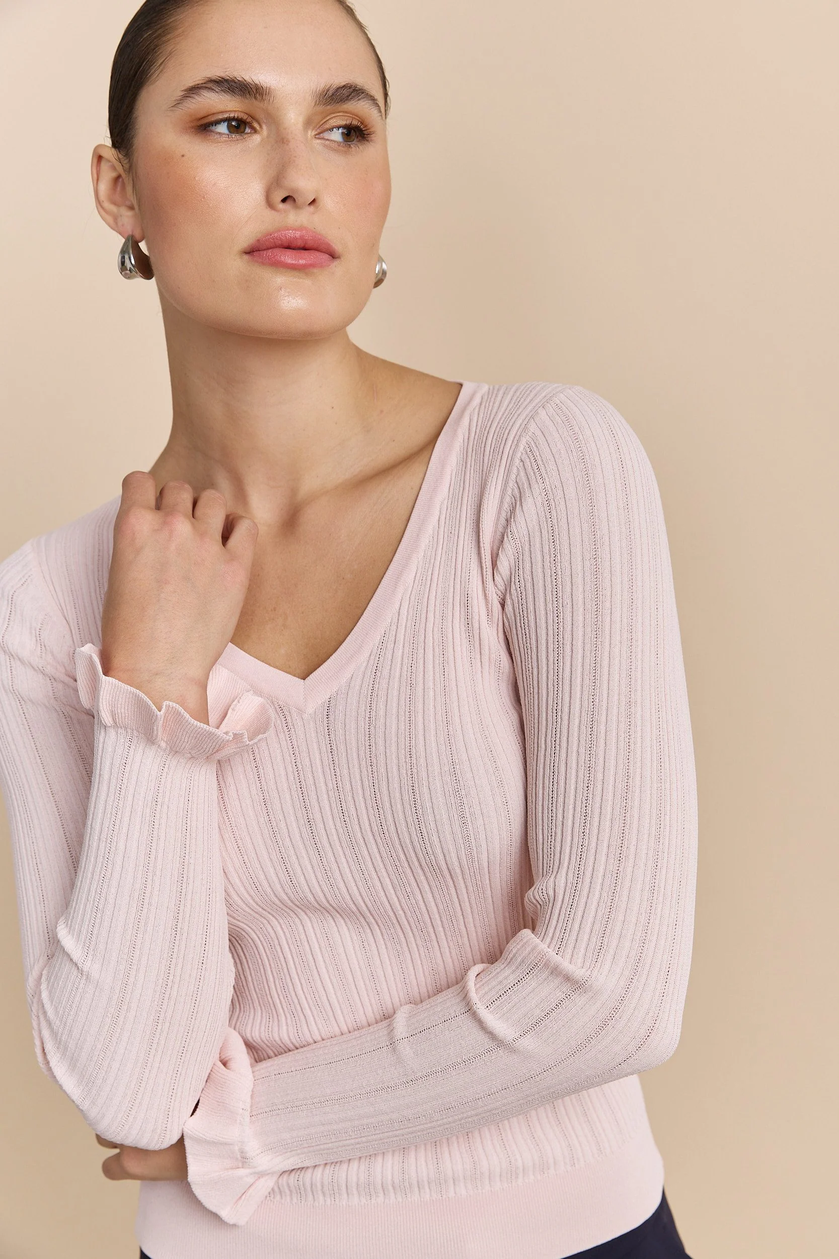 Sweater with ruffle cuffs